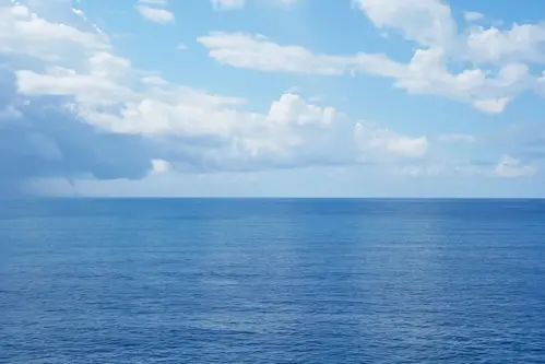 Sky meets sea on a sunny day.
