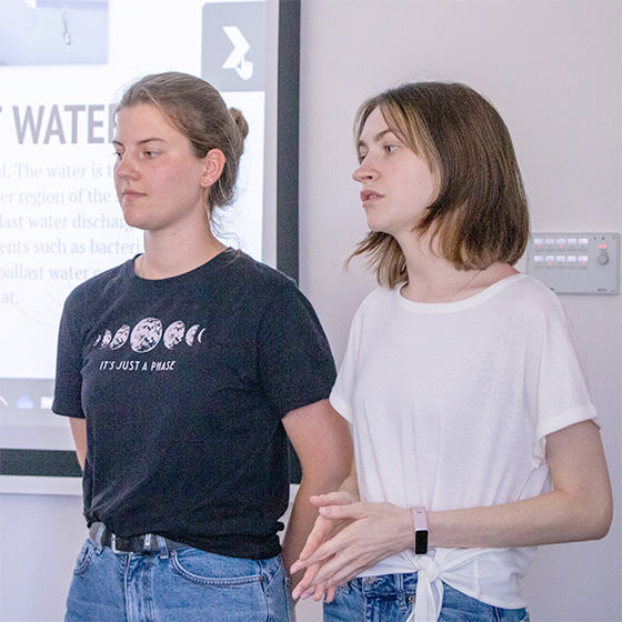 Two people giving a presentation