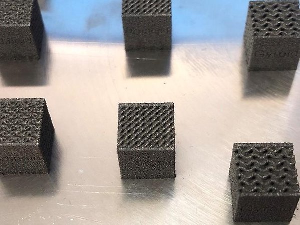 Rare-earth-free magnesium metallic glasses enabled by additive manufacturing