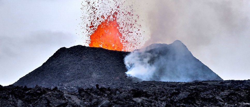 Lava coming out from a black volcano.