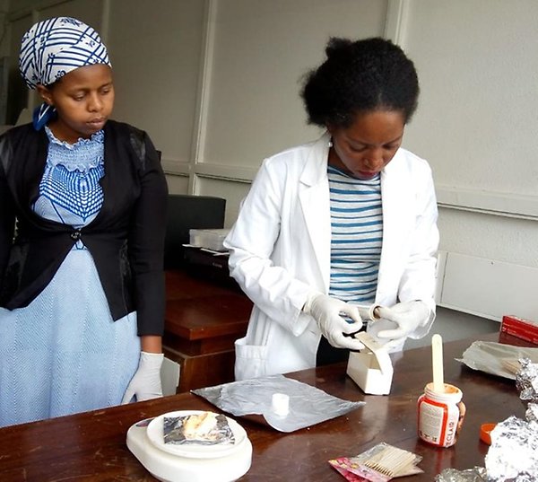 Dr Dehayem-Massop together with her mentee Sarah Kabura in the department lab.