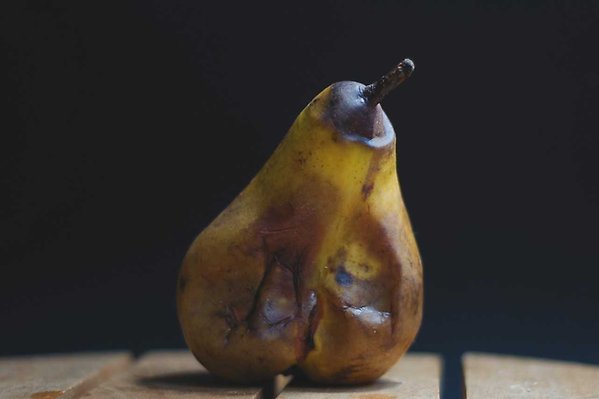 A pear that is getting mouldy